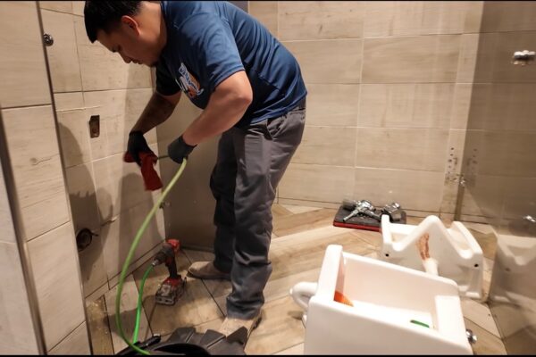 Urinal and Sewer Line Descaling in Downtown Austin, Texas